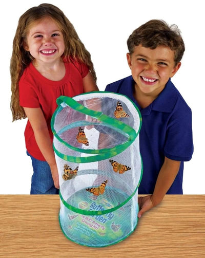 2 smiling children enjoying the 5 orange and black butterflies flutter inside 18-inch tall green pop-up mesh habitat.